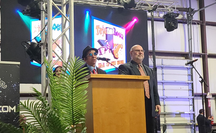 Georgetown resident Johnny Joe Leal, left, is inducted to the Tejano R.O.O.T.S Hall of Fame earlier this month. Mr. Leal was one of four guitarists inducted under the Million Dollar Band, Guitar Player category.