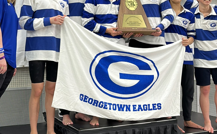 The Georgetown High School boys swim team celebrates Saturday, February 18, at this weekend’s Conference 5A State Championship meet in Austin. The team won first place for the first time in school history. (Photo courtesy University Interscholastic League)