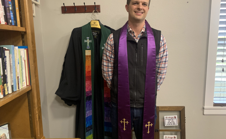 First Presbyterian Church of Georgetown pastor Bobby Hulme-Lippert wears a purple stole, which he will wear during services held throughout the Lenten season. Lent, which is commemorated by many Christian denominations, begins this year with Ash Wednesday on February 22 and continues until Easter, April 9.