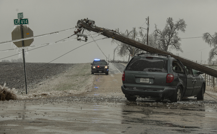 A vehicle ran into a utility pole at the intersection of County Road 414 and County Road 417 Wednesday, February 1, south of Granger Lake. (Photos by Andy Sharp)