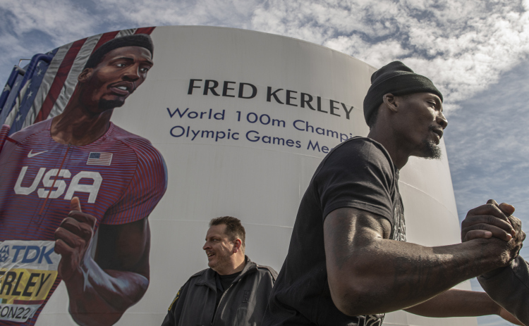Taylor native Fred Kerley is pictured at the dedication of a mural painted by Taylor artist Adam Davenport at 1602 North Main Street,  honoring him on Saturday, February 4. (Photos by Andy Sharp)