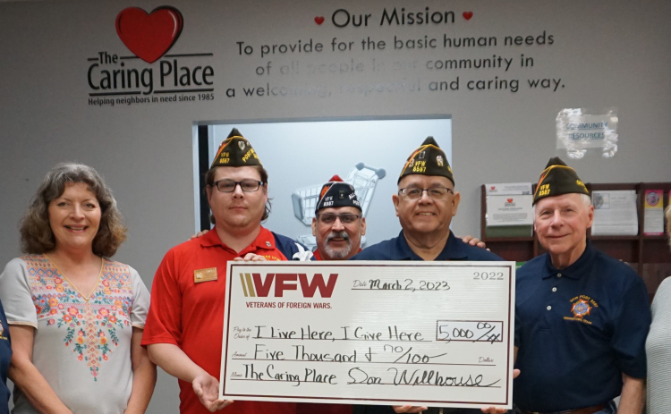 From left, Jim Holden, post quartermaster; Rita Turner, community engagement manager – The Caring Place; Abran Yates, post senior vice commander; Ray Sanchez, post adjutant; Frank Espinosa, Jr., post webmaster; Reggie Brockwell, post member; and Ginna O’Connor, The Caring Place executive director.