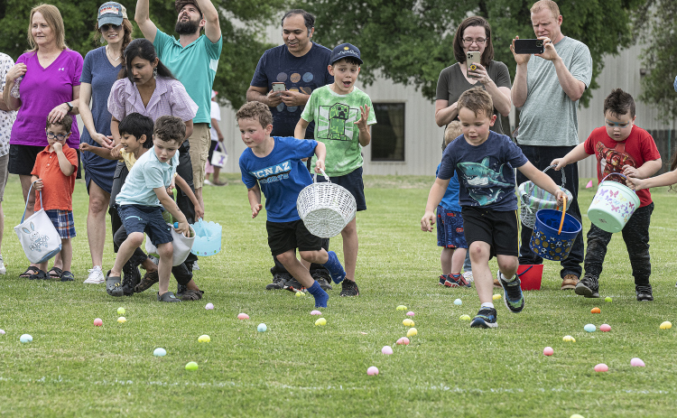 Children make a dash for eggs during the Georgetown Church of the Nazarene Easter Egg Hunt last year.