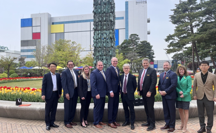 Sung Min Hong (Samsung EVP, head of Foundry Human Resources Team), Dave Porter (executive director, WilCo EDP), Dana Harris (Samsung), Precinct 4 Commissioner Russ Boles, Taylor Mayor Brandt Rydell, President Si Young Choi (head of Foundry Division), Williamson County Judge Bill Gravell, Brian LaBorde (Taylor city manager), Charisse Bodisch (SVP, Opportunity Austin), Sang Phil Sim (EVP, head of Foundry marketing & sales) met in South Korea last week. Photo courtesy Williamson County