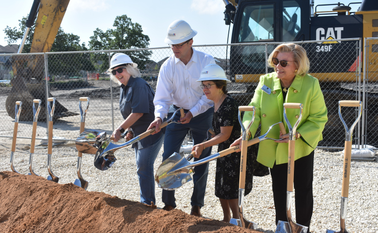 From left, GISD trustee Stephanie Blanck, GISD superintendent emeritus Fred Brent and trustee Jen Mauldin share groundbreaking duties with Elizabeth Horne, far right, developer of Santa Rita Ranch with her husband, Ed Horne.