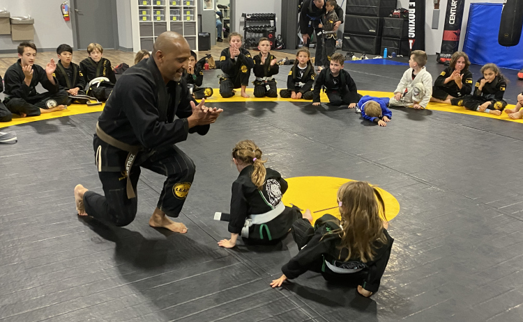 Coach and Co-Owner JJ Martinez teaches a jiu jitsu class at John’s Gym in Georgetown.