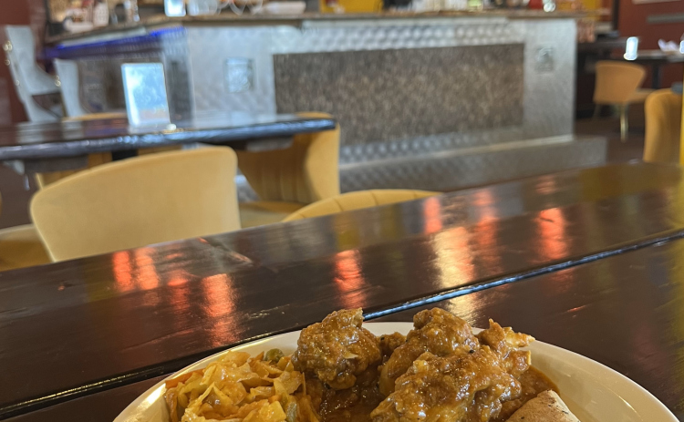 An order of Namaste’s Nepali style of Chicken Curry, Cabbage Masala, Kachumber salad and naan.