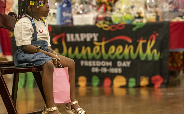3-year-old attendee Shylah Soloye enjoyed watching Austin's Smooth & EZ Dance Company perform during Georgetown's 71st Juneteenth celebration.