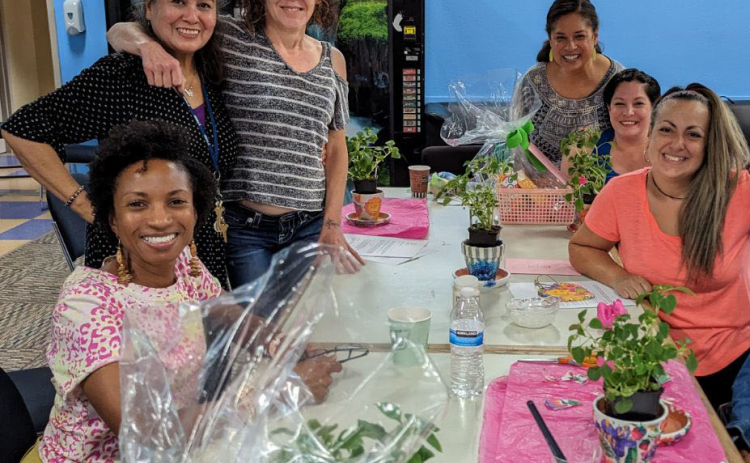 From left, Tiowa Collier, Mommie Support Network administrative assistant, Dahlia Gonzales, Georgetown Housing Authority services coordinator, mother Jami Littleton, Alicea Jones, Mommie Support Network executive director and founder, mother Sara MacDonald and mother Andrea Fallas-Nunez.  Photos courtesy Mommie Support Network