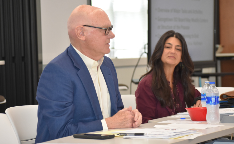 Search firm consultants Rick Berry and Jodi Duron work with trustees to develop a search calendar in May.