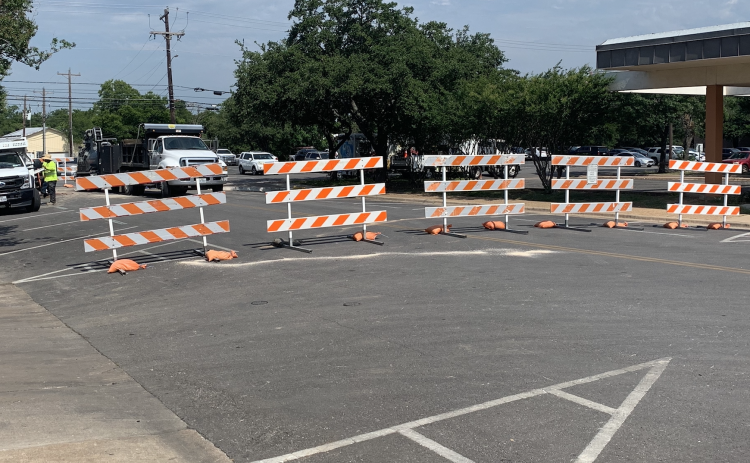 Barricades make a street closure at Seventh Street and Rock Street June 8. Photo by Kaitlyn Wilkes