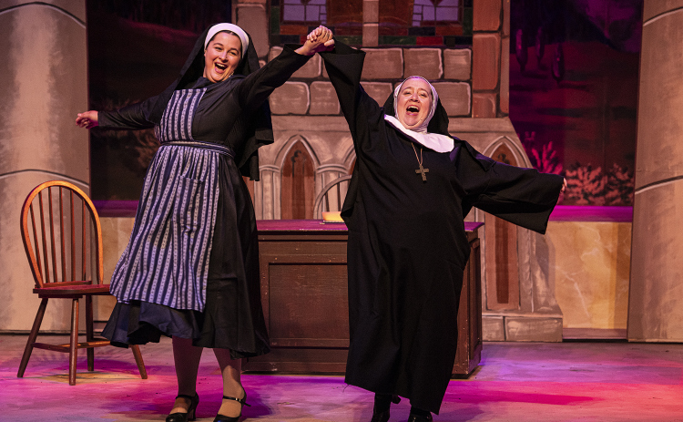 Cassidy Thompson, left, as Maria Rainer, and Jennifer Tucker, playing Mother Abbess,  are shown in a Thursday, August 17, 2023 scene from the Georgetown Palace production of "The Sound of Music," playing on the Springer Stage through September 17.  Photo by Andy Sharp.