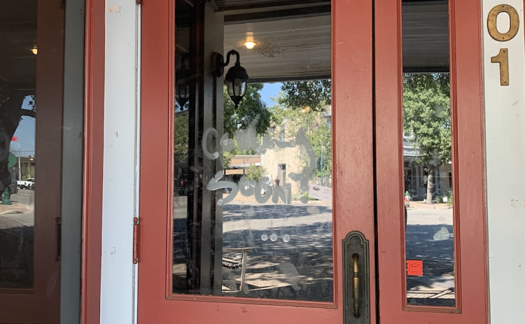 The door at 701 South Main Street reads "Coming Soon!". Photo by Kaitlyn Wilkes