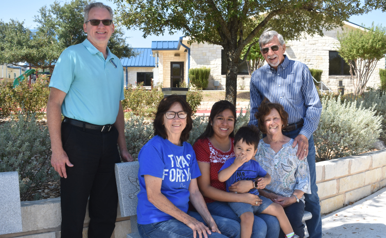 Sharing Santa Rosa are Steve Kliman, parish services coordinator, left; and parishioners Jean Plentl, Deanna Herrera and Elsie and Lynn Parrish.