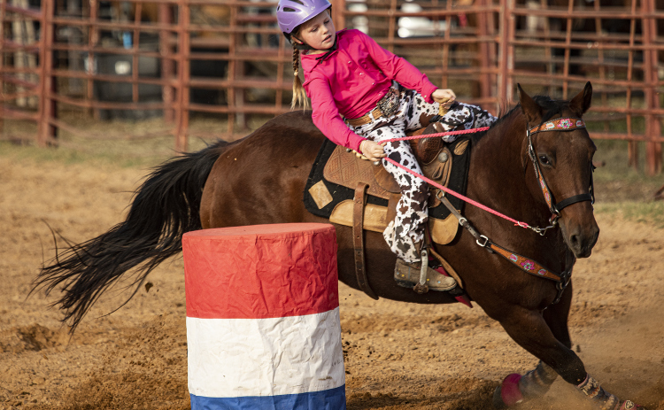 Lexi Miller, 8, competes in Young Guns & Alumni Barrel Racing during the 29th Annual Clayman Rodeo, held at Windsong Farm October 8, 2022. Sun Archive.
