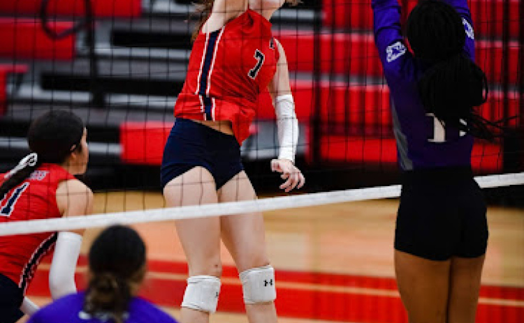 East View senior Ashlyn Walther elevates for a spike, during the Patriots' September 8 home victory over the Elgin Wildcats. (Photo by David Hernandez)