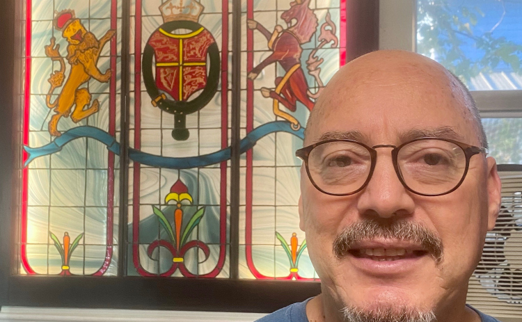 A stained glass window created by Jose “Papi” Parra is a fixture at Papi’s Pies restaurant in Round Rock.