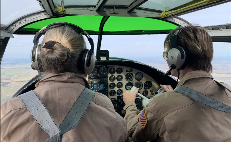 Pilots Beth Jenkins and Valerie Scott used their combined years of experience to fly the Devil Dog during the Field of Honor Flyover Saturday, November 4. (Photo Credits Kaitlyn Wilkes)