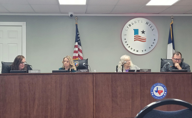 Liberty Hill City Council members listen to the facility initiatives for future Public Safety, a new library and Recreation Center/YMCA. From left to right, Council Member Amanda Young Place 4, Mayor Pro Tem Crystal Mancilla, Mayor Liz Branigan and Council Member Michael Helbing, Place 2. Photo by Nalani Nuylan.