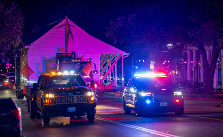The Palm House is transported throughout Round Rock at night, escorted by the Round Rock Police Department. Photos courtesy of the City of Round Rock.