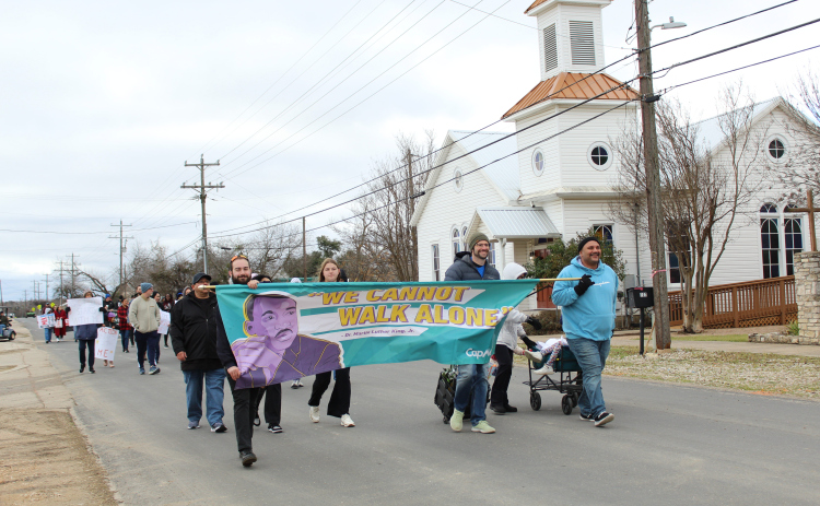 Volunteers lead the Leander’s Martin Luther King Day march at South West Drive in Old Town Leander on Saturday, January 28.