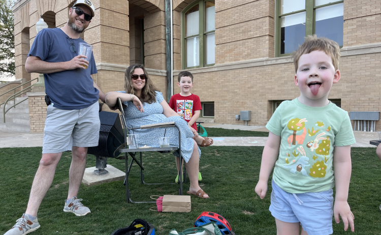 CJ and Courtney Johnson enjoy the warm weather Wednesday afternoon, March 13, on the Williamson County Courthouse with Everett (red shirt) and Grant. Spring Break in Georgetown ISD was this week, March 11-15, and many took to the outdoors and downtown Georgetown to celebrate.. 