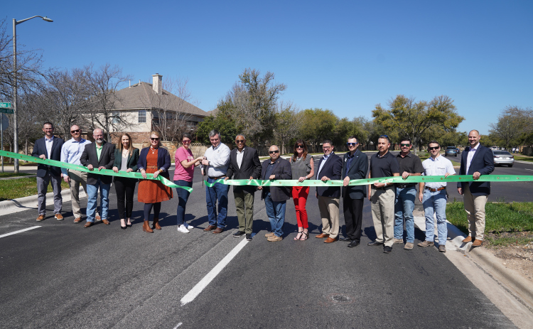City of Cedar Park staff, along with design and construction partners, cut the ribbon celebrating the Anderson Mill Road Phase 2 project completion. Photos courtesy of Cedar Park.