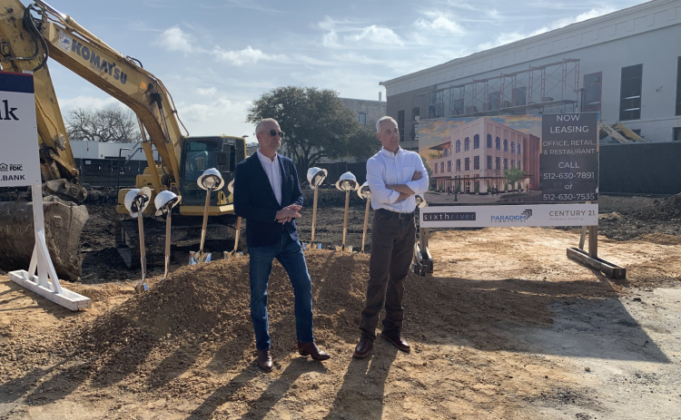 Scott Stribling and Mayor Josh Schroeder speak to those in attendance about the impact of the new project on Sixth Street in the changing downtown area of Georgetown. (Photo by Kaitlyn Wilkes)