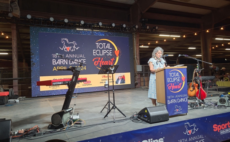 ROCK Founder and CEO Dr. Nancy Krenek gives a speech at the 18th annual Barn Dance on Saturday, April 6.