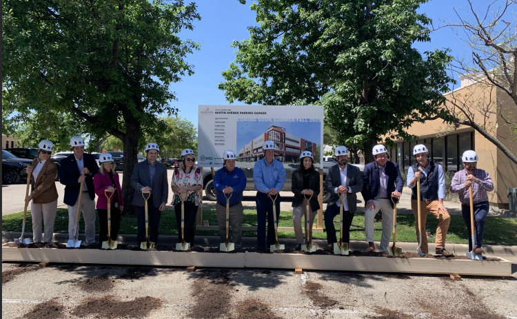 Georgetown City Council and representatives from architect and engineering firm WGI and construction firm Swinerton break ground on the new parking garage. (Photo by Kaitlyn Wilkes)