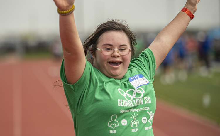 East View High student Lux Adcock finishes a race during  the Georgetown Independent School District's annual Special Olympics, held Tuesday, May 7, 2024  at the district sports complex behind Georgetown High School.     Photo by Andy Sharp. 