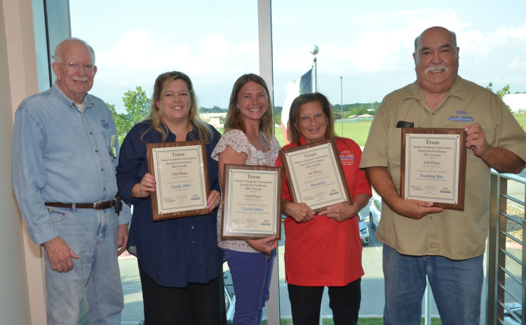 Photo from left to right: Dr. Wayne Schirner, Francine Erickson, Catherine Nickle, Judy Williams, President of the Williamson County Master Gardeners Association Bob Hinojosa pose with awards celebrating the group’s achievements with youth programs, research and teaching. Photo courtesy of the Williamson County AgriLife Extension Office.
