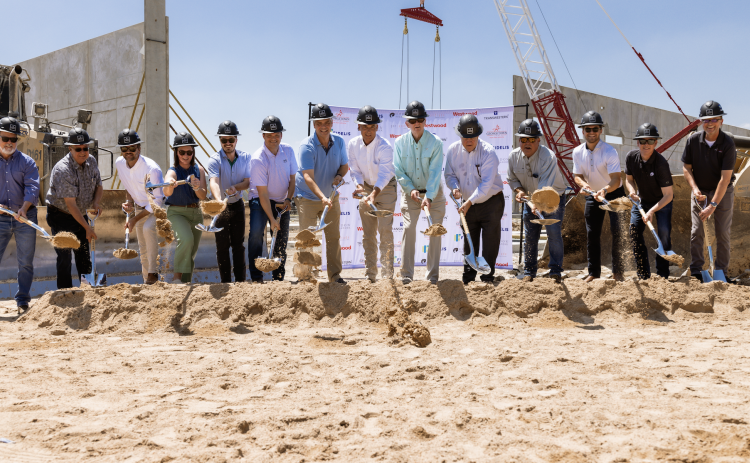 Georgetown Mayor Josh Schroeder, center, and City Manager David Morgan, to the mayor’s immediate left, were joined by architects from GSR Andrade, leadership from Gordon Highlander Construction and Westwood Civil, members of the longstanding landowners and members from Fidelis and Transwestern. (Courtesy Transwestern)