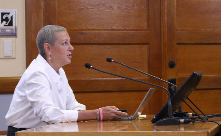 Wilco Budget Officer Ashlie Holladay presents the proposed Fiscal Year 2025 budget for the county during the August 6 Commissioners Court meeting at the historic courthouse. Photo by Nalani Nuylan.