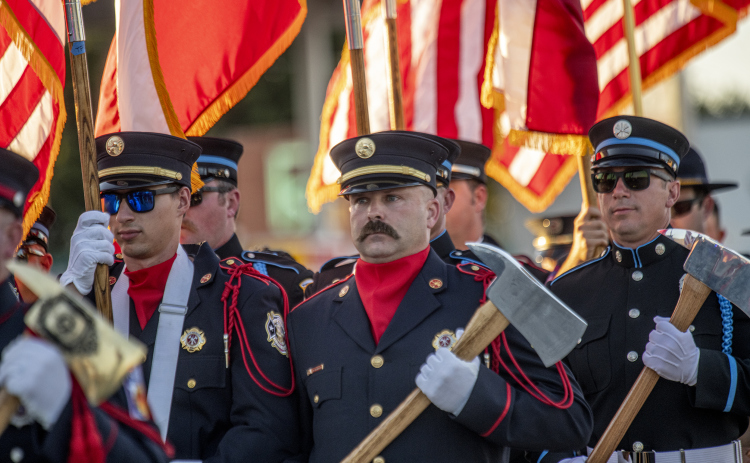 Members of the Taylor Fire Department take part in the parade along Main Street  during the Patriot Day observance on Wednesday evening, September 11, 2024.   Patriot Day commemorates the events of September 11, 2001.    Photo by Andy Sharp.