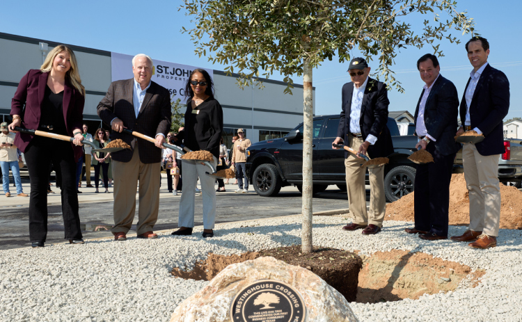 An oak tree is planted in Georgetown during a ribbon cutting ceremony to honor St. John Properties’ first development in Texas. Representatives with St. John Properties and the City of Georgetown include, from left, Regional Partner Brooke Harlander; Greater Austin Economic Development Corporation Chairman Gary Farmer; Georgetown Business Retention and Expansion Manager Conchita Gusman; Founder and Chairman Ed St. John; President and CEO Larry Maykrantz; and Senior Executive Vice President Sean Doordan.
