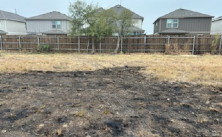 Maydell and Larry Foust’s property is scorched by a wildfire caused by fireworks during Halloween. Photo courtesy of Maydell and Larry Foust.
