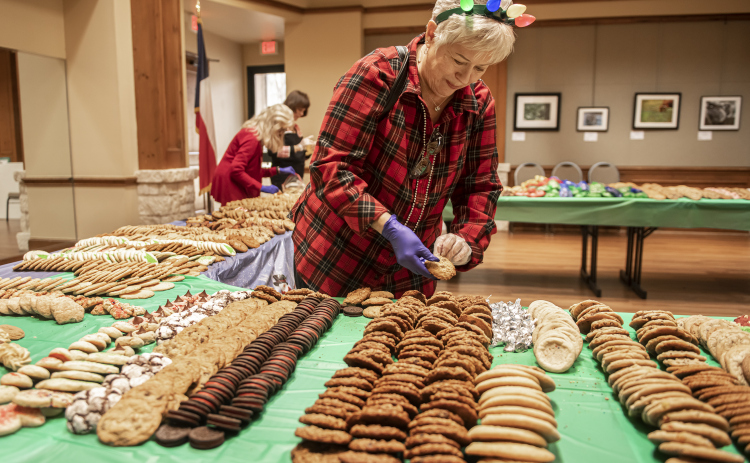 Sun City resident Margaret Hornsby was one of the volunteers helping prepare 500 dozen homemade cookies for the Women Helping Others.