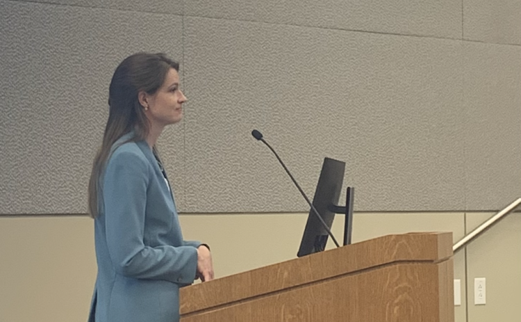 Assistant to the City Manager Jessica Clarke presents potential changes to the city’s grant program on November 26. (Photo by Kaitlyn Wilkes)