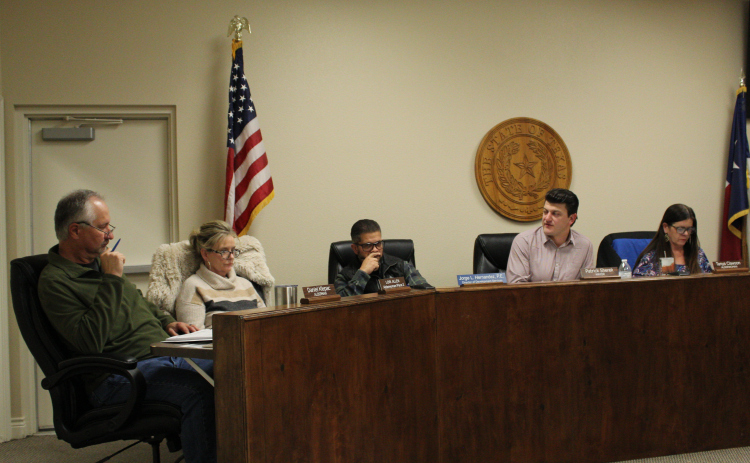 Jarrell City Council, from left to right Mayor Pro Tem Daniel Klepac, Alderwoman Place 2 Lori Allen, Interim City Manager Jorge Hernandez, Mayor Patrick Sherek and Alderwoman Place 3 Tanya Clawson discuss the first city council meeting of the year, January 7. Photo by Nalani Nuylan.