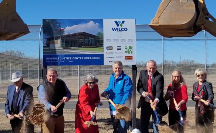 From left to right, Congressman John Carter, County Commissioner Russ Boles, County Commissioner Terry Cook, County Judge Bill Gravell, Juvenile Services Executive Director Scott Matthew, County Commissioner Cynthia Long and County Commissioner Valerie Covey break ground on the Juvenile Justice Center in Georgetown, Friday.