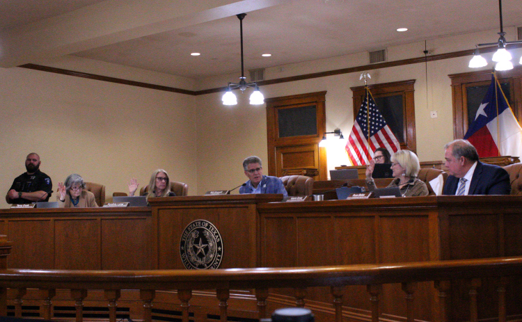 County Commissioners Terry Cook, Cynthia Long and Valerie Covey vetoed the proposed $140,000 salary during the February 4 Commissioners Court meeting. Photo by Nalani Nuylan.