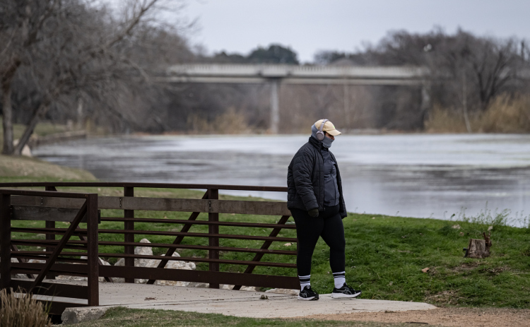 Natalie Bogart enjoyed  a walk  at San Gabriel Park on a very frigid Wednesday afternoon, February 19, 2025, when temperatures were in the low-mid 20s. Photo by Andy Sharp