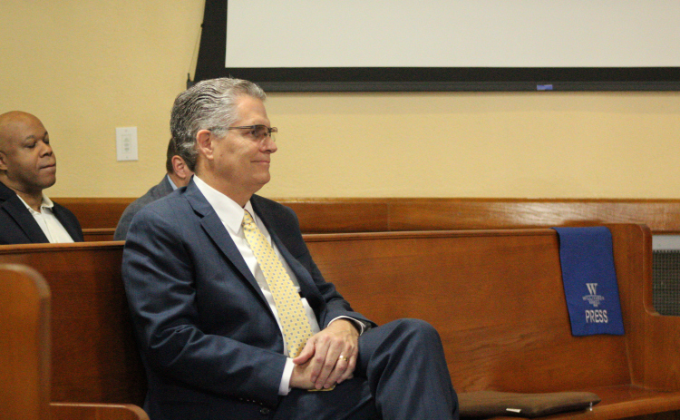 Former County Judge Bill Gravell sits as an audience member, hearing the Commissioners wish him well on his next adventure after he resigned as County Judge, March 11. Photo by Nalani Nuylan.