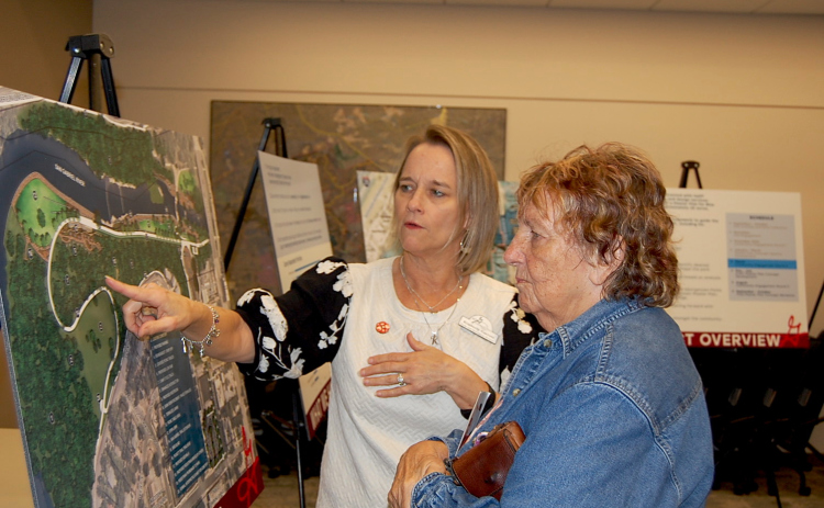 Kimberly Garrett, Parks and Recreation Director, left, talks with resident Joyce Radloff about the Blue Hole Park Master Plan and potential changes coming to the park. (Photos by Kaitlyn Wilkes)