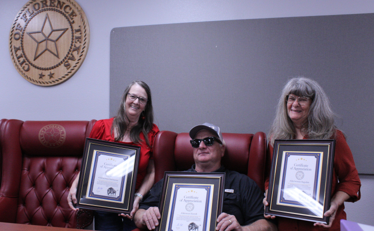 Council members, from left, Denise Diechmann, Mike Harrell and Lesa Ragsdel received a certificate of appreciation from the City of Florence for their years of service on the council. Photo by Nalani Nuylan.