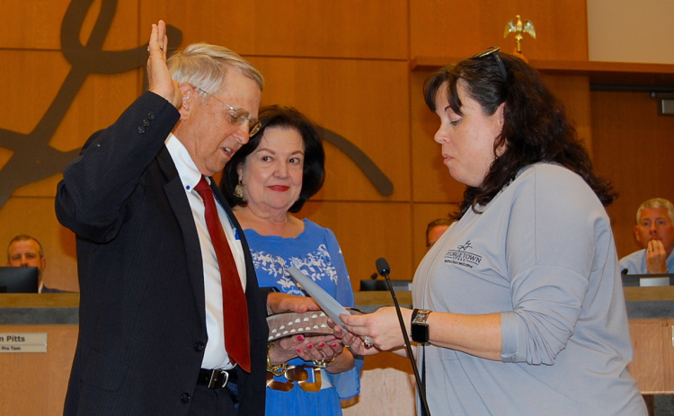 New District 3 Council Member Ben Butler was joined by his wife Betty, middle, during his swearing in on May 13. (photos by Kaitlyn Wilkes)