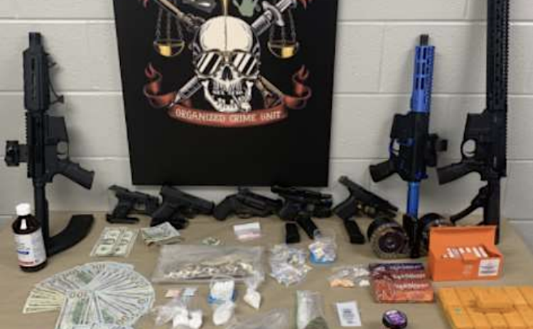 Assorted guns, cash and drugs were found by the sheriff’s office. (Photo courtesy Williamson County Sheriff's Office)