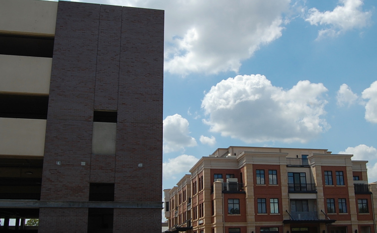 The new brick color is darker than the Tamiro building, seen on the right, was chosen so it didn’t blend into the other building. (Photo by Kaitlyn Wilkes)