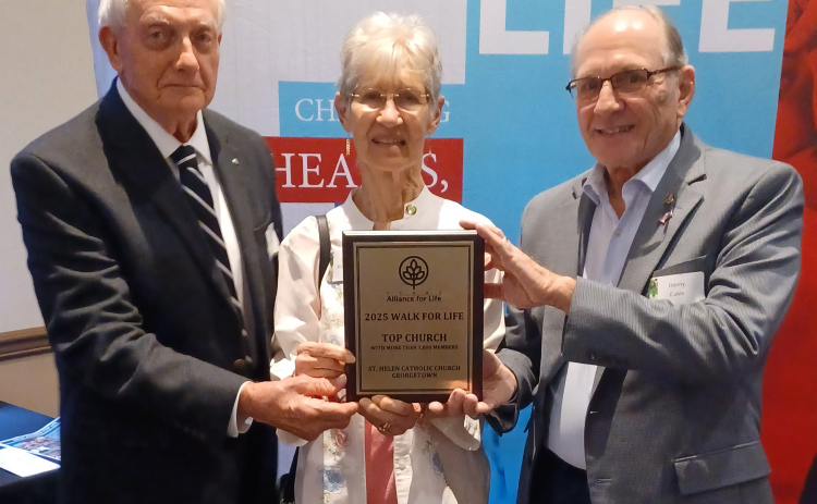 Robert Rauschuber, Judy Whitfield and Danny Cable accepted the Texas Alliance Walk for Life’s Top Church award on behalf of the parish.  Photo courtesy Danny Cable